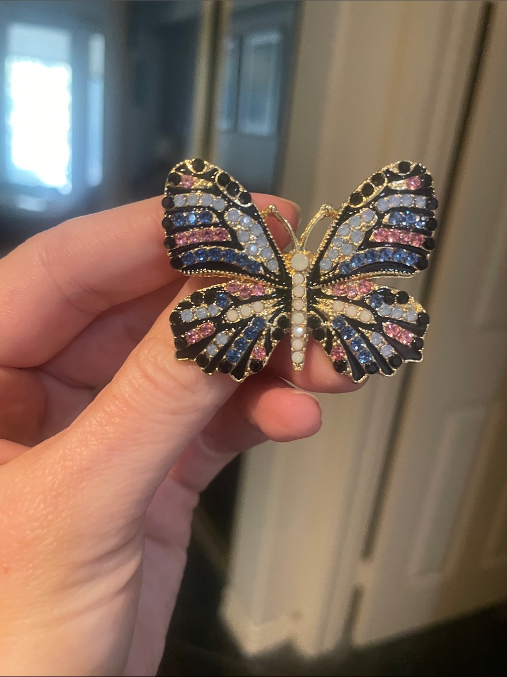Black rhinestone butterfly brooch